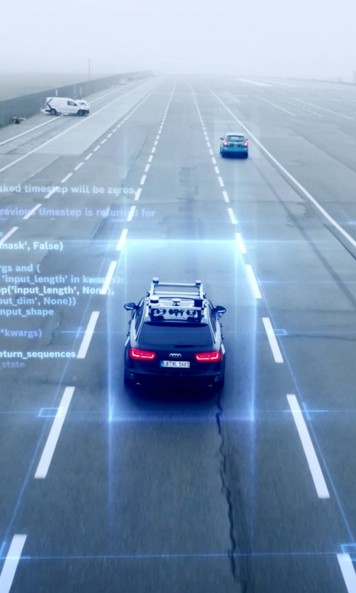 A car on a road with sodtware code visualizing the automated driving functions.